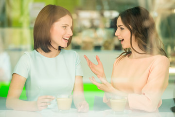 Girls sharing secrets