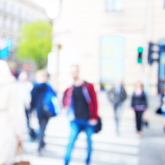 People in city at crosswalk