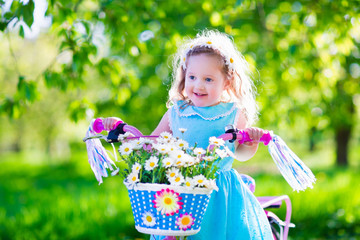 Little girl riding a bike