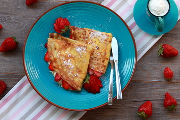 Crepes with cheese cream and fruits