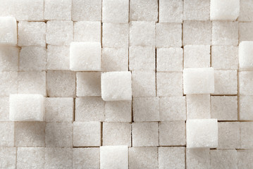 Sugar cubes background. - obrazy, fototapety, plakaty