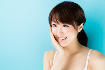 attractive asian woman beauty image on blue background