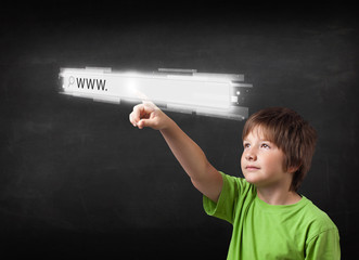 Young boy touching web browser address bar with www sign