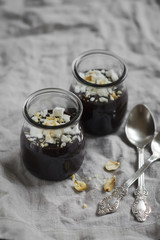 chocolate pudding with meringue crumbs and nuts