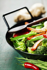 colorful stir fry in a wok