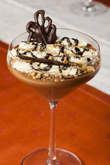 Chocolate mousse in glass with decoration