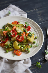 roasted vegetables in a light vintage plate 