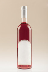 Red wine bottle with empty label