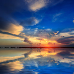 nice sunset over water surface