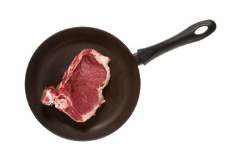 Piece of meat in pan isolated on white