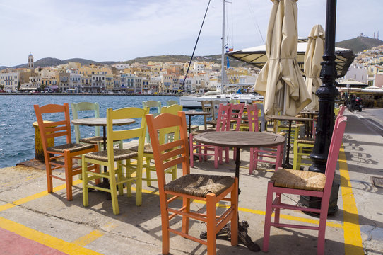 Restaurants with colorful tables and chairs. Ermoupoli. Syros.