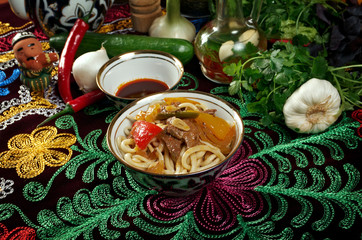 Fototapeta na wymiar oriental uzbek soup lagman - Uzbek cuisine
