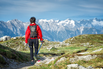 Fototapeta premium Girl makes hiking Italian Alps