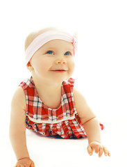 Portrait of little baby girl crawls on a white background