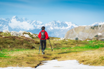 Girl makes trekking Italian Alps