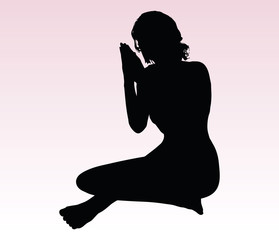 woman silhouette with hand gesture praying
