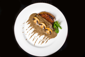 Meat steak with mushrooms
