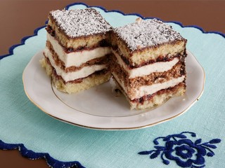 layer cake with coconut,jam and jelly