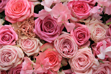 Lathyrus and roses in a wedding bouquet