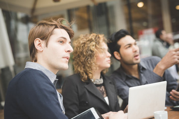 Multiracial business people working outdoor in town