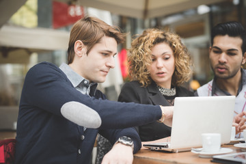 Multiracial business people working outdoor in town