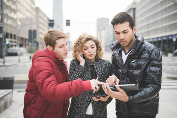 Multiracial business people working outdoor in town
