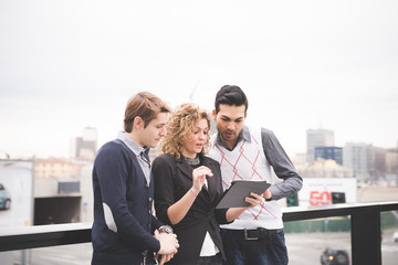 Multiracial business people working outdoor in town