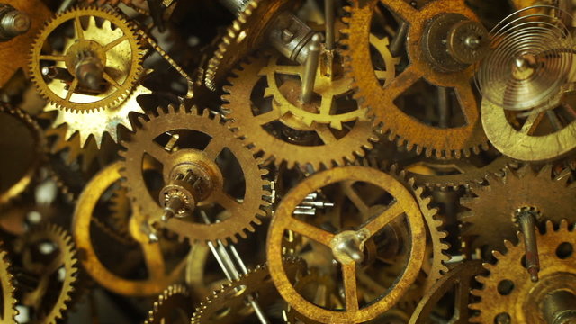 Old watch gears background with appering new ones