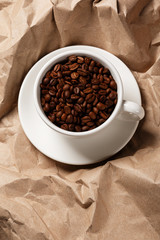 Coffee over crumpled paper surface