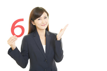 数字を持つビジネスウーマン