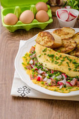 Omelette with spring vegetables and bacon