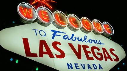 Las Vegas sign with red neon light panel illumination on the Las Vegas Strip in Las Vegas, dark night sky, Nevada, USA. sin city, entertainment diversity