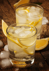 Fresh water with lemon, mint and ice, selective focus