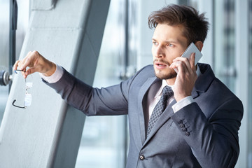 Handsome businessman on the phone