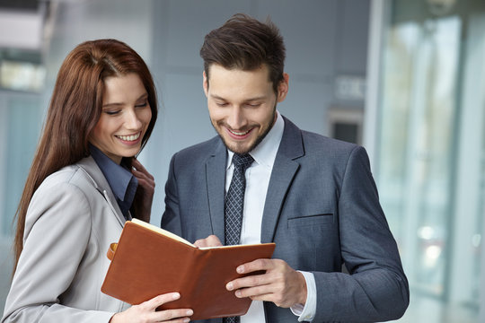 Portrait Of Two Smiling Business Persons