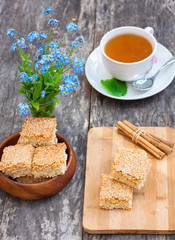 homemade sesame cookies with cup of tea