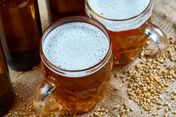 Glass and bottles of beer