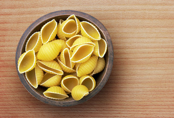 Pasta in wooden bowl