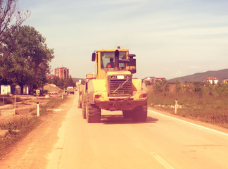 Bulldozer on the road