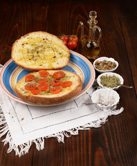 Bread baked in a wood seasoned - Pane cotto a legna condito