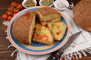 Bread baked in a wood seasoned - Pane cotto a legna condito