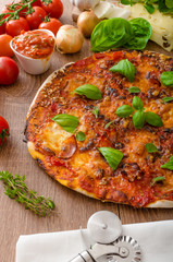 Cheese pizza with chilli and basil