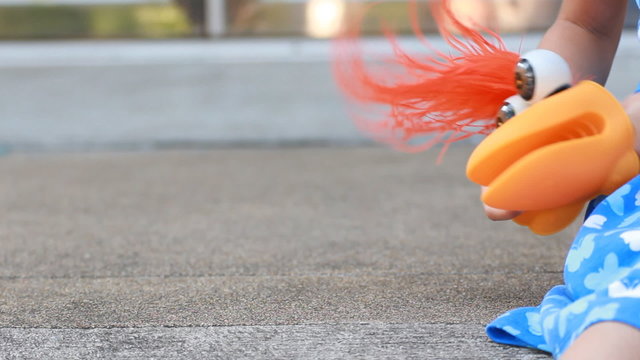 girl playing hand puppet