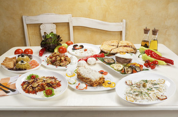 Various dishes served on the table.