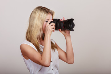 Photographer girl shooting images