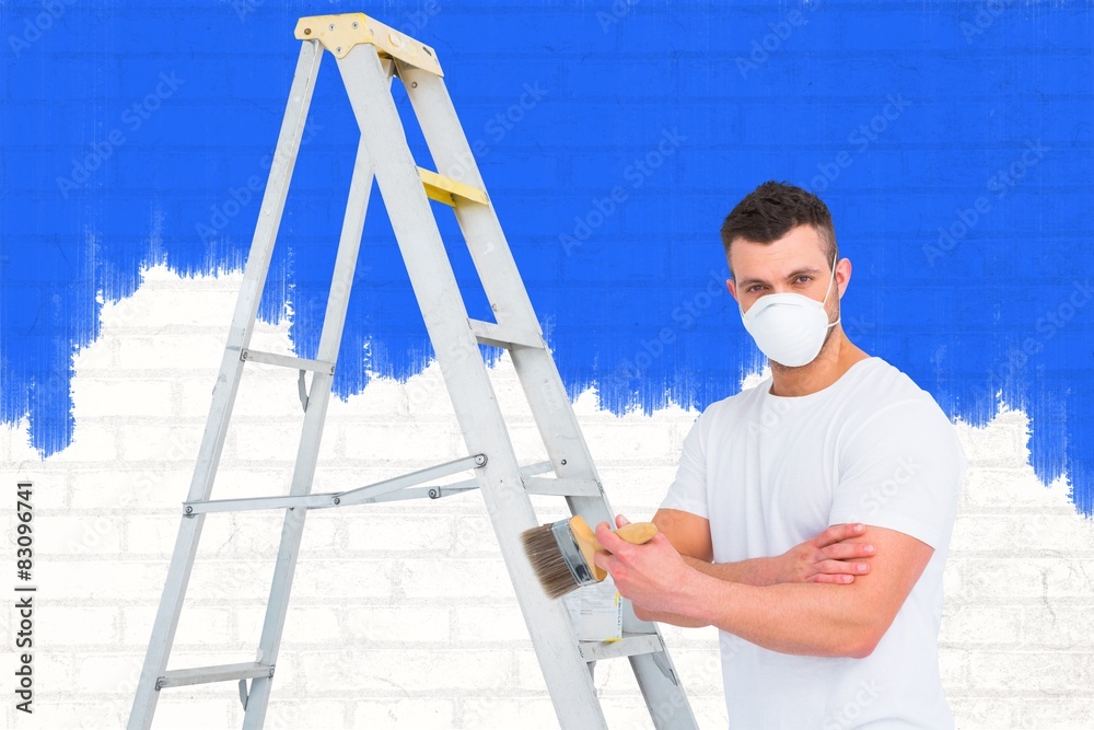Poster Composite image of handyman with paintbrush and ladder 