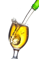 Beer splash in a glass, isolated on white background