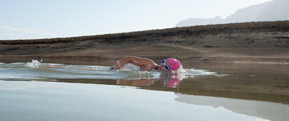 Female swimmer in a dam