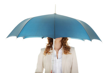 Businesswoman holding an umbrella.