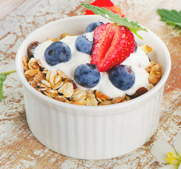 Muesli and yogurt with fresh berries